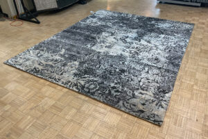 A Black & White Floral Rug
