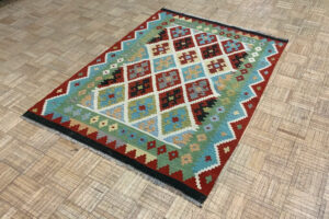 A Colorful Geometric Kilim Rug For Kids
